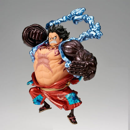 Action figure of a character with a muscular build, red pants, and blue energy effects on a gray background.