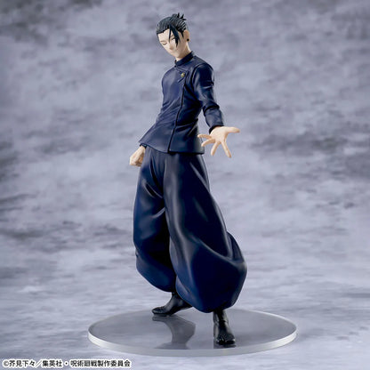 Figure of a character in a dark outfit on a gray background