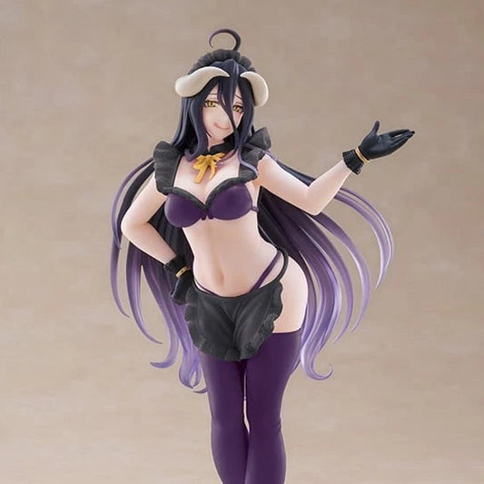 An anime-style female figurine with long dark purple hair, wearing a black and purple outfit with a small horned headpiece, posed against a plain beige studio background.