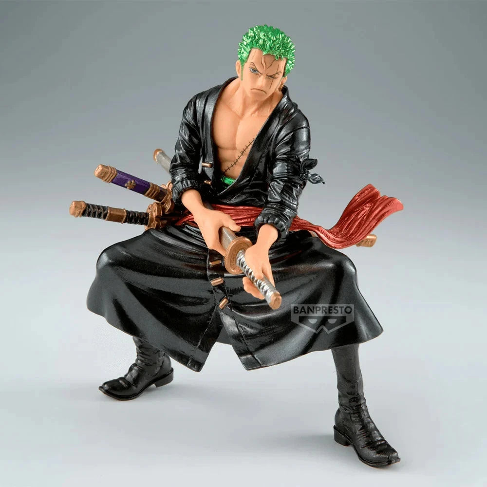 Action figure of a character with green hair and multiple swords on a gray background