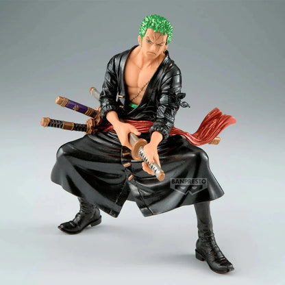Action figure of a character with green hair and multiple swords on a gray background