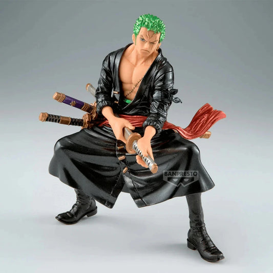 Action figure of a character with green hair and multiple swords on a gray background