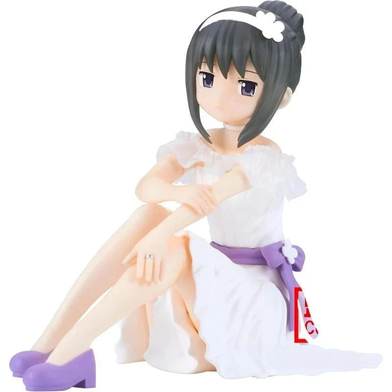 Figurine of a character in a white dress with purple accents on a white background