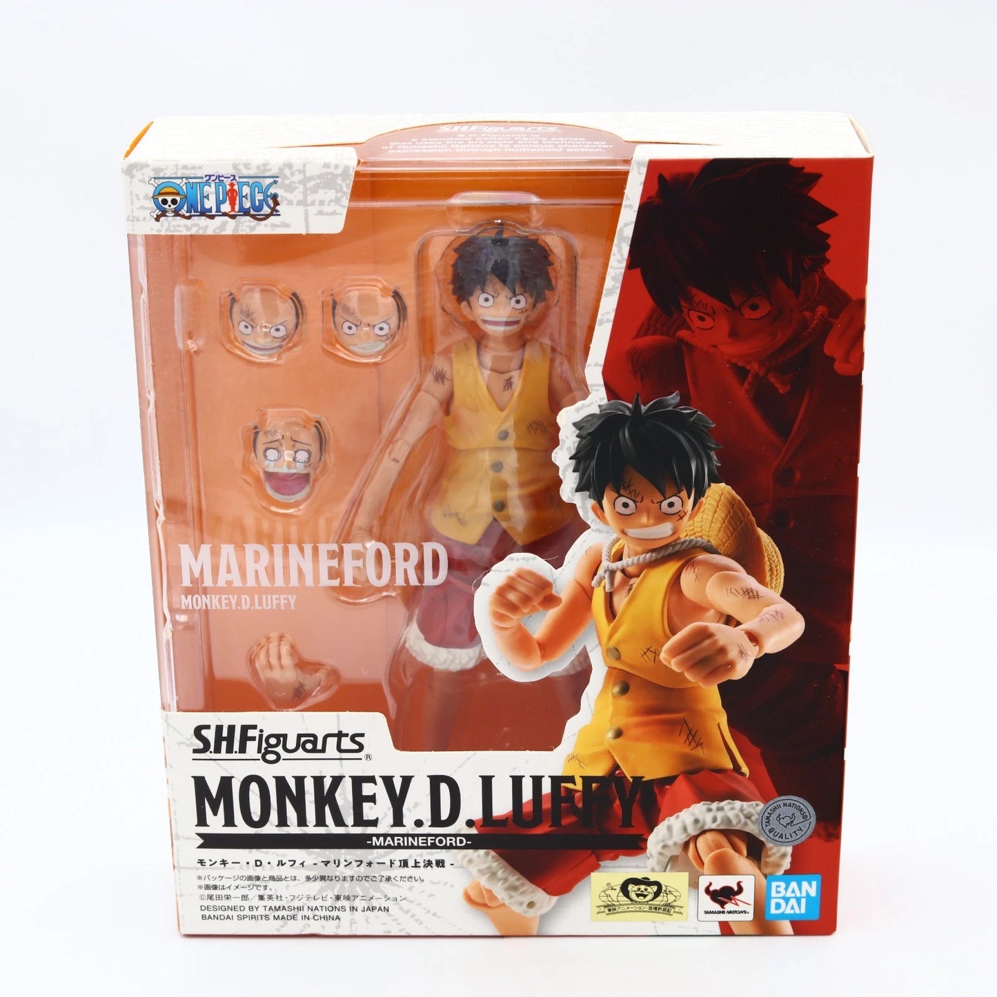 SH Figuarts Monkey D. Luffy Marineford action figure in its original packaging, featuring multiple interchangeable heads and accessories, with anime artwork on the box.