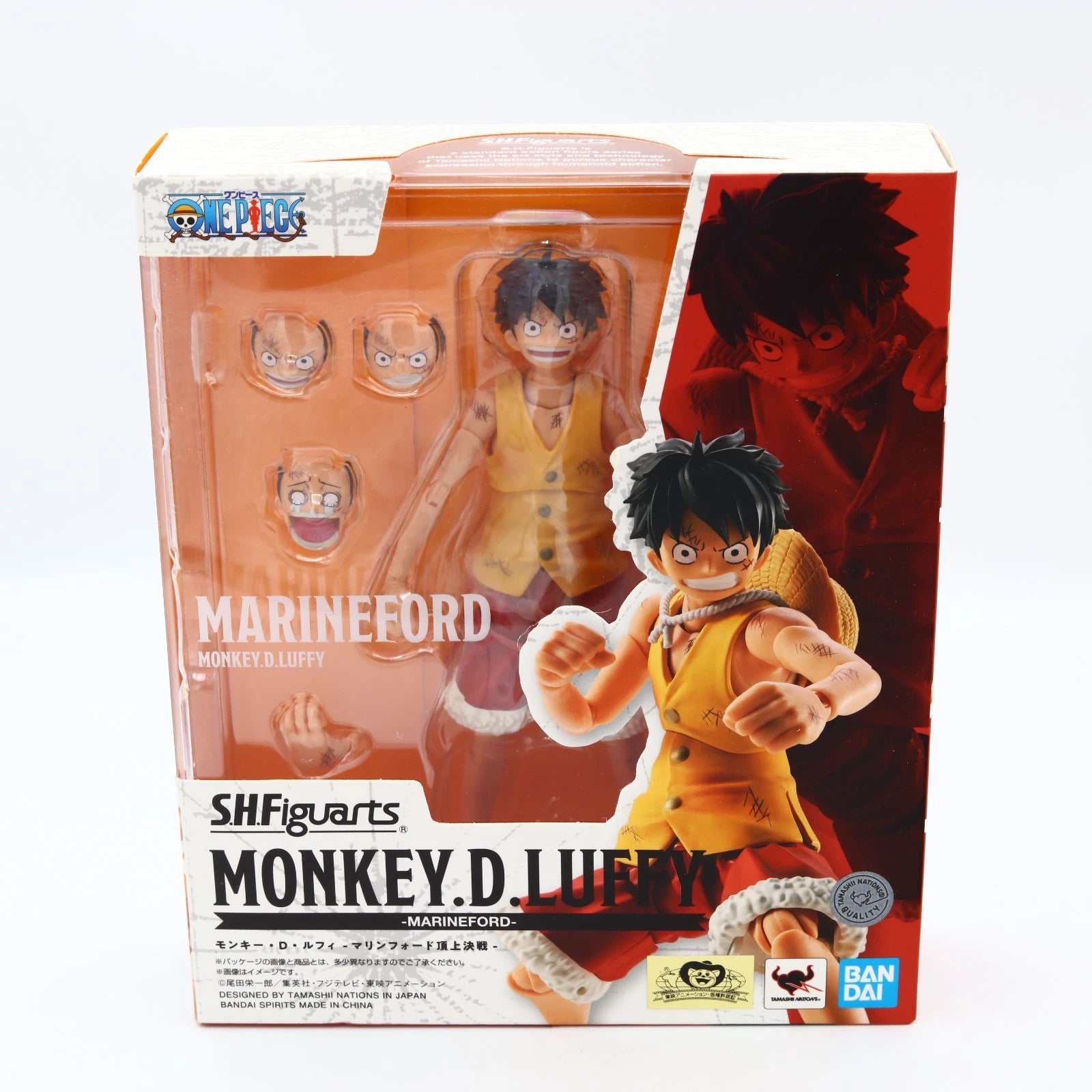 SH Figuarts Monkey D. Luffy Marineford action figure in its original packaging, featuring multiple interchangeable heads and accessories, with anime artwork on the box.