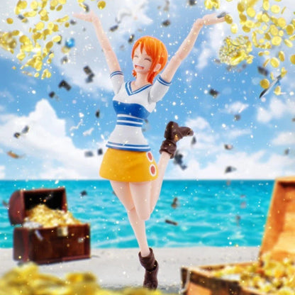 Figurine of a character with orange hair and a blue and white outfit standing on a beach with treasure chests and confetti.