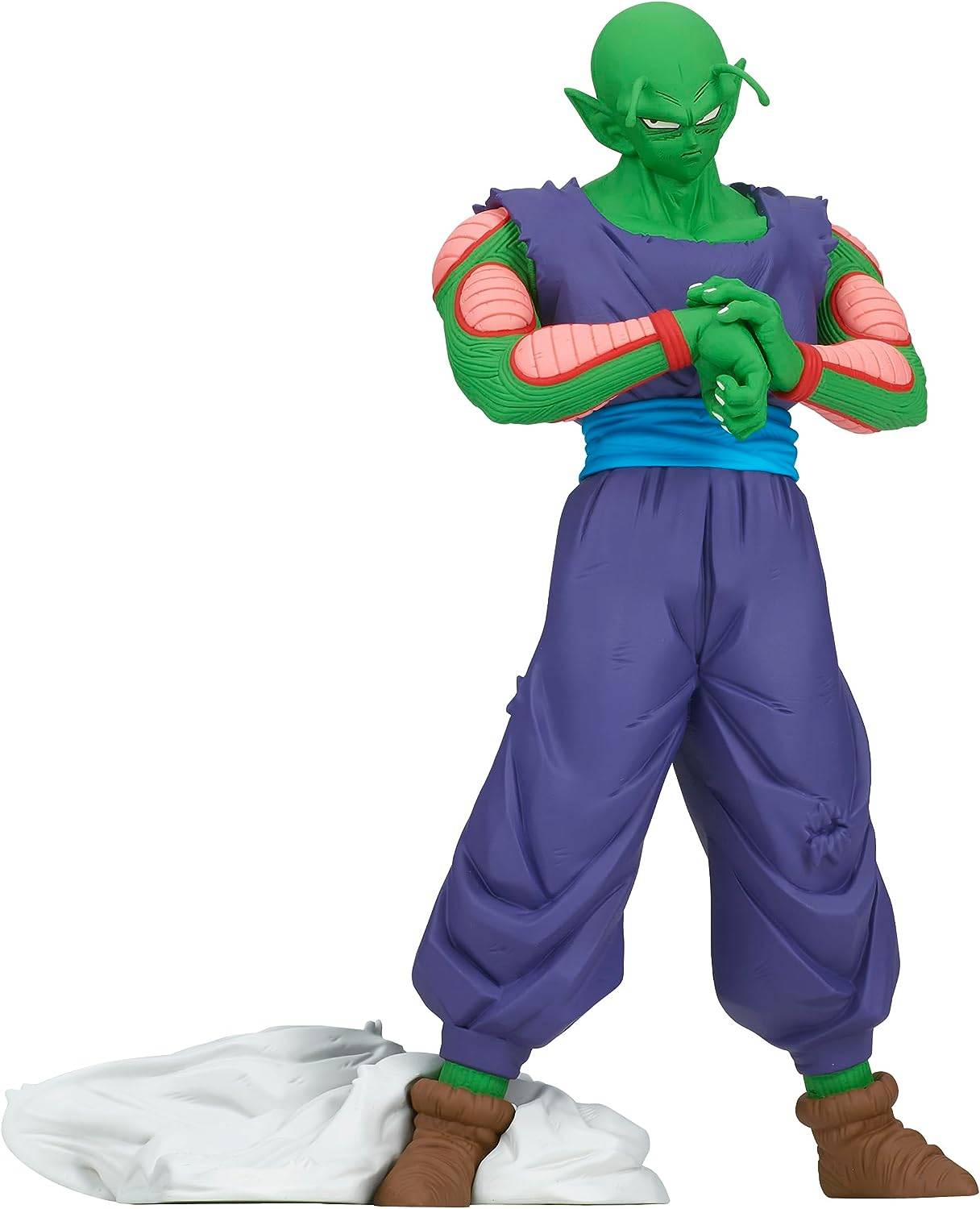 Green alien character in a purple outfit with a white background